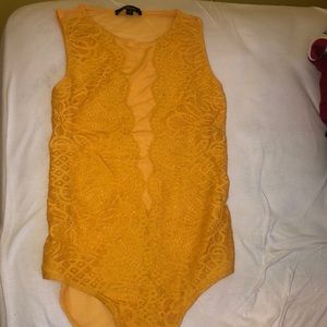 Yellow lace/mesh bodysuit
